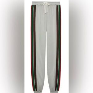 Men's Gucci technical jersey track pants with signature red/green stripe
XXXL